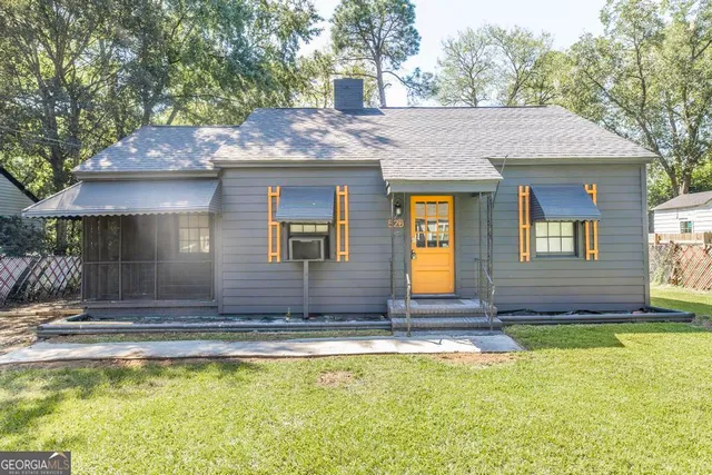 a view of pool with yard