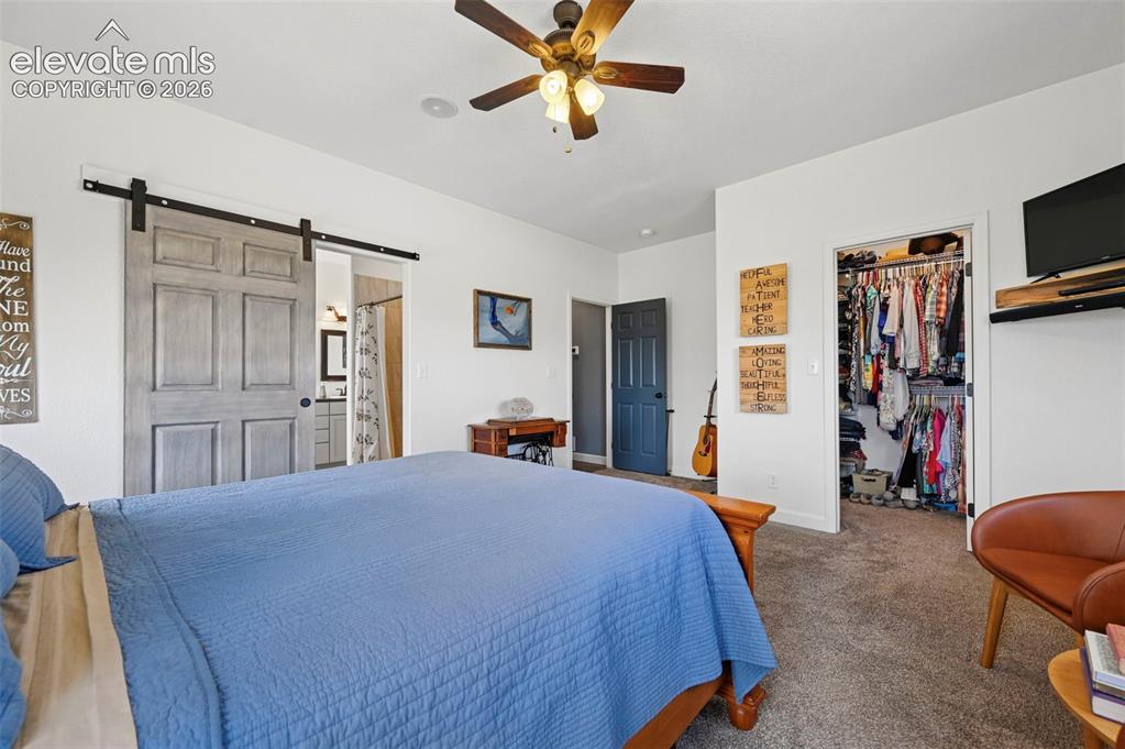 40051 Cold Iron Road Rush, CO 80833 - Photo 22 of 50 Primary Bedroom with Walk-In Closet