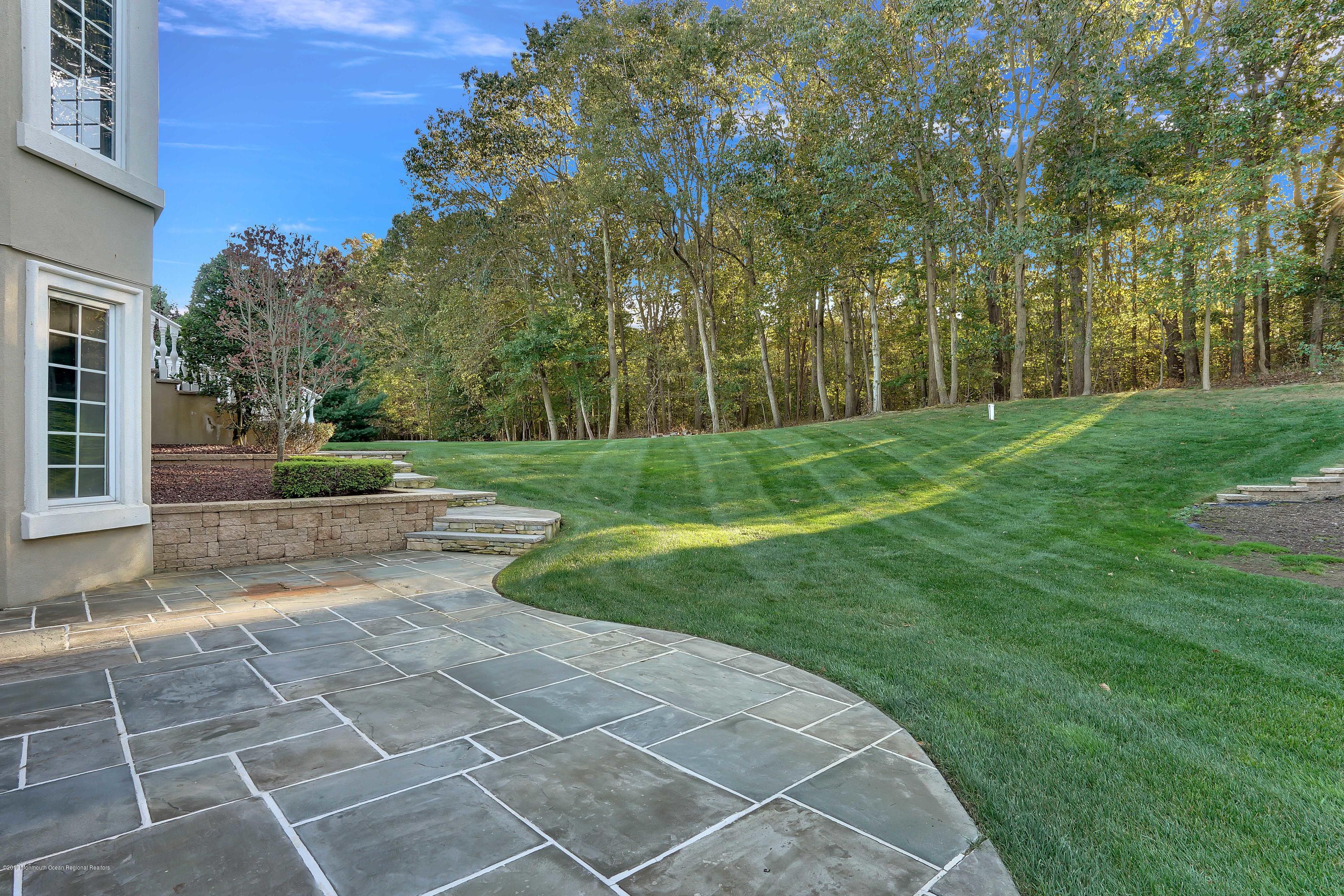 109 Stone Hill Road Colts Neck, NJ 07722 - Photo 51 of 58 Bluestone Patio and Walkway to Terrace
