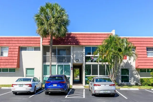 a car parked in front of a house