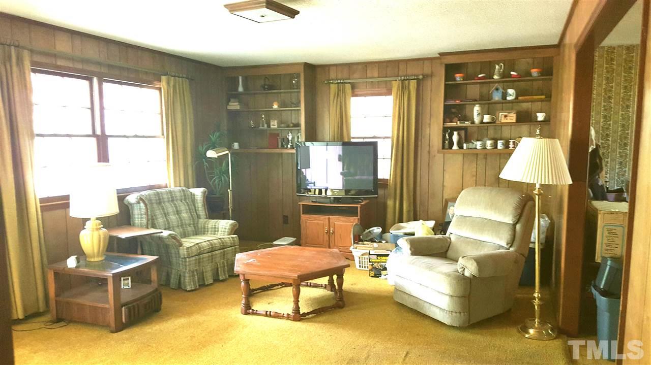 13624 New Light Road Raleigh, NC 27614 - Photo 2 of 12 a living room with furniture and a window