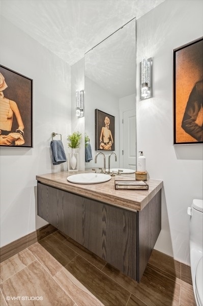 363 East Wacker Drive, Unit 2103 Chicago, IL 60601 - Photo 18 of 19 a bathroom with a sink and mirror