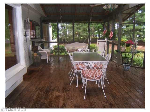 7914 Grey Fox Road Oak Ridge, NC 27310 - Photo 10 of 16 Sunroom.