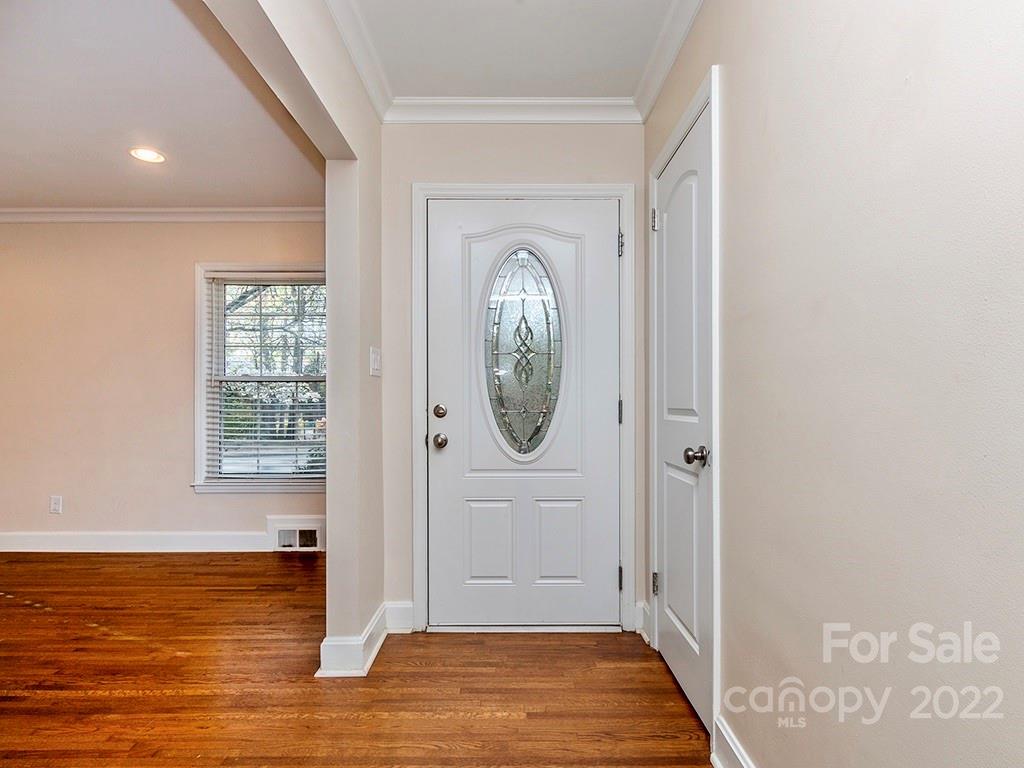 259 North Sharon Amity Road Charlotte, NC 28211 - Photo 4 of 27 a view of a livingroom with wooden floor and a window