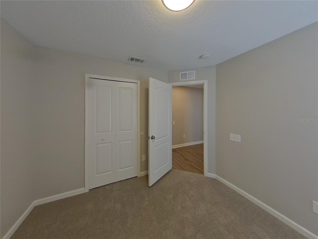 Undisclosed Address Riverview, FL 33579 - Photo 11 of 17 a view of an empty room
