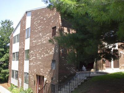 1553 Creekside Road, Unit B22 Whitehall, PA 18052 - Photo 1 of 1 a view of a building with a yard