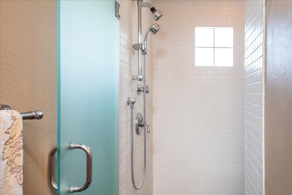 800 East Cottonwood Road, Unit 2 Palm Springs, CA 92262 - Photo 13 of 29 a bathroom with a shower