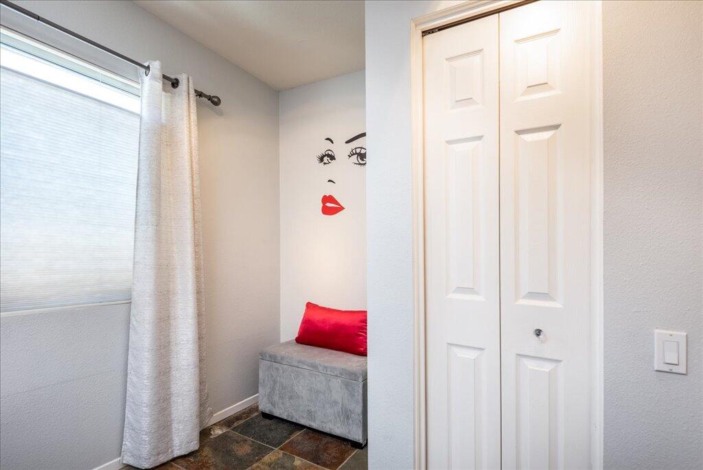 800 East Cottonwood Road, Unit 2 Palm Springs, CA 92262 - Photo 15 of 29 a room with a white cabinet and a white walls