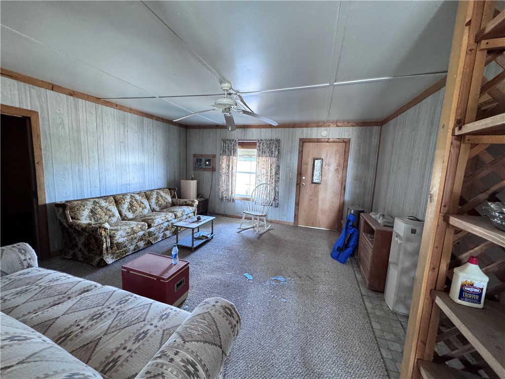 21188 South Cheyenne Road Yucca, AZ 86438 - Photo 19 of 24 Living area featuring ceiling fan