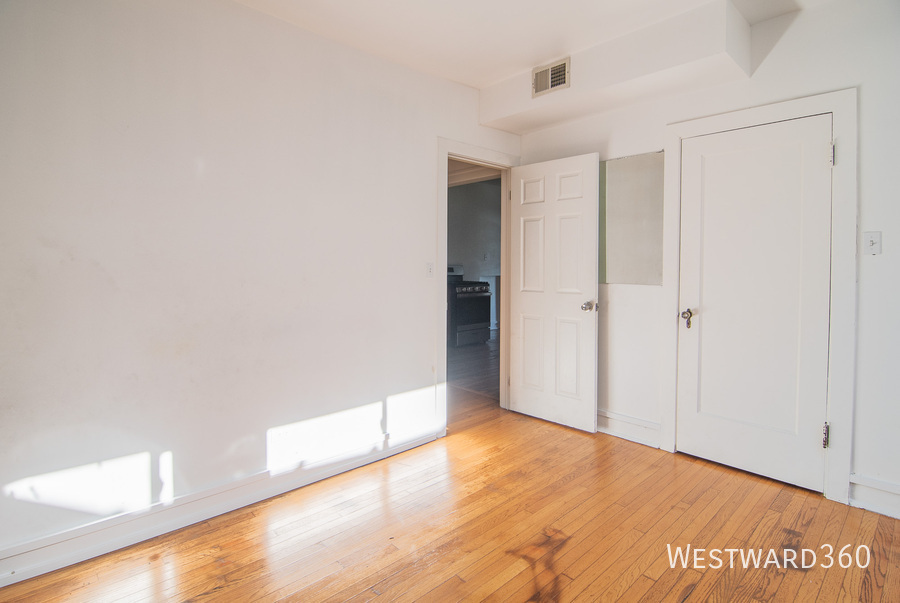 7833 South Kingston Avenue, Unit 2 Chicago, IL 60649 - Photo 3 of 15 a view of an empty room