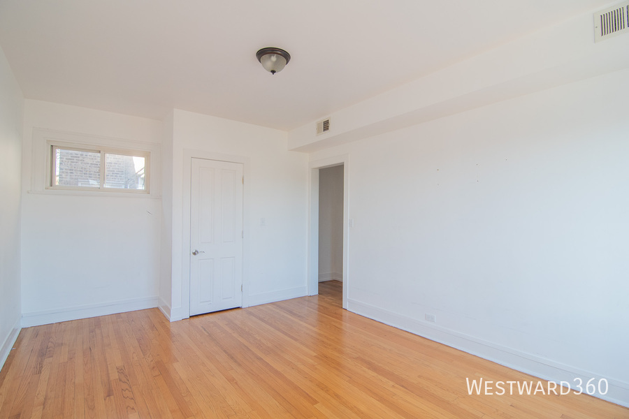 7833 South Kingston Avenue, Unit 2 Chicago, IL 60649 - Photo 10 of 15 a view of an empty room