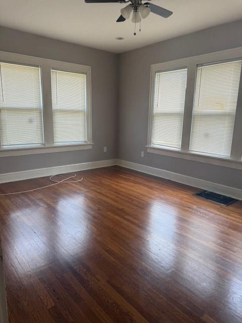 2701 Stuart Drive Fort Worth, TX 76104 - Photo 6 of 9 a view of an empty room with wooden floor and a window
