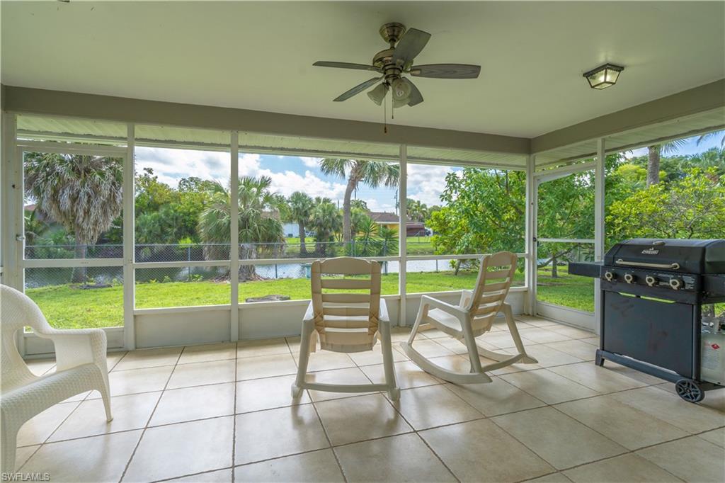 2100 55th Street Southwest Naples, FL 34116 - Photo 45 of 50 a view of a porch with furniture and garden