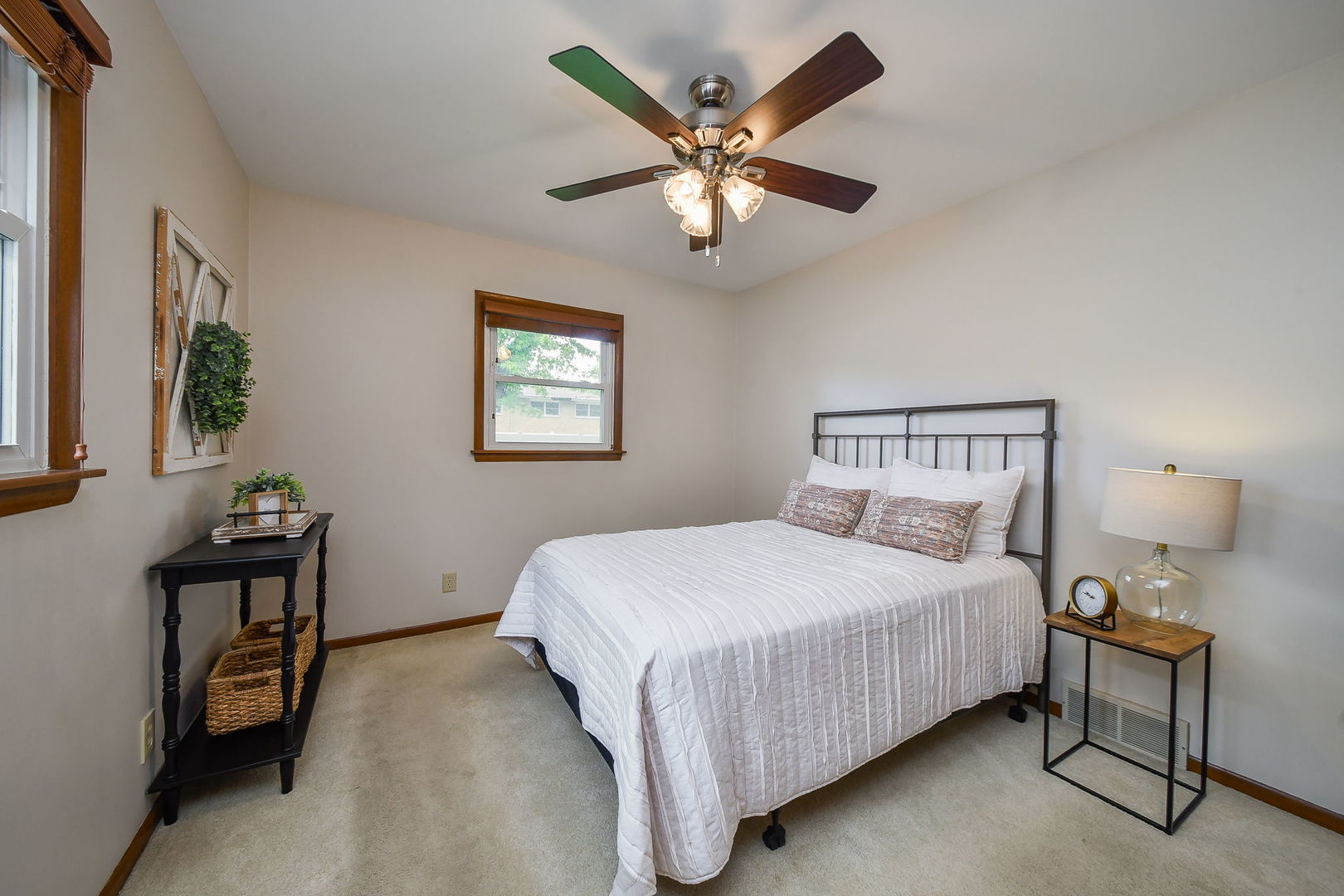 1920 Richard Street Aurora, IL 60506 - Photo 15 of 23 a bedroom with a bed and a chandelier