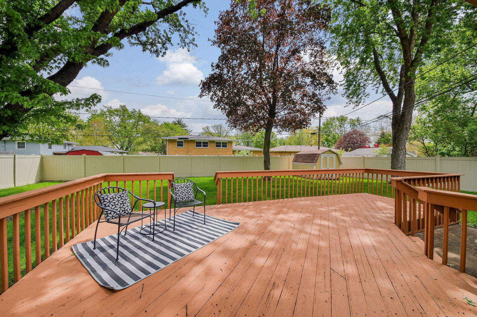 1920 Richard Street Aurora, IL 60506 - Photo 20 of 23 a view of deck with patio and yard with seating space
