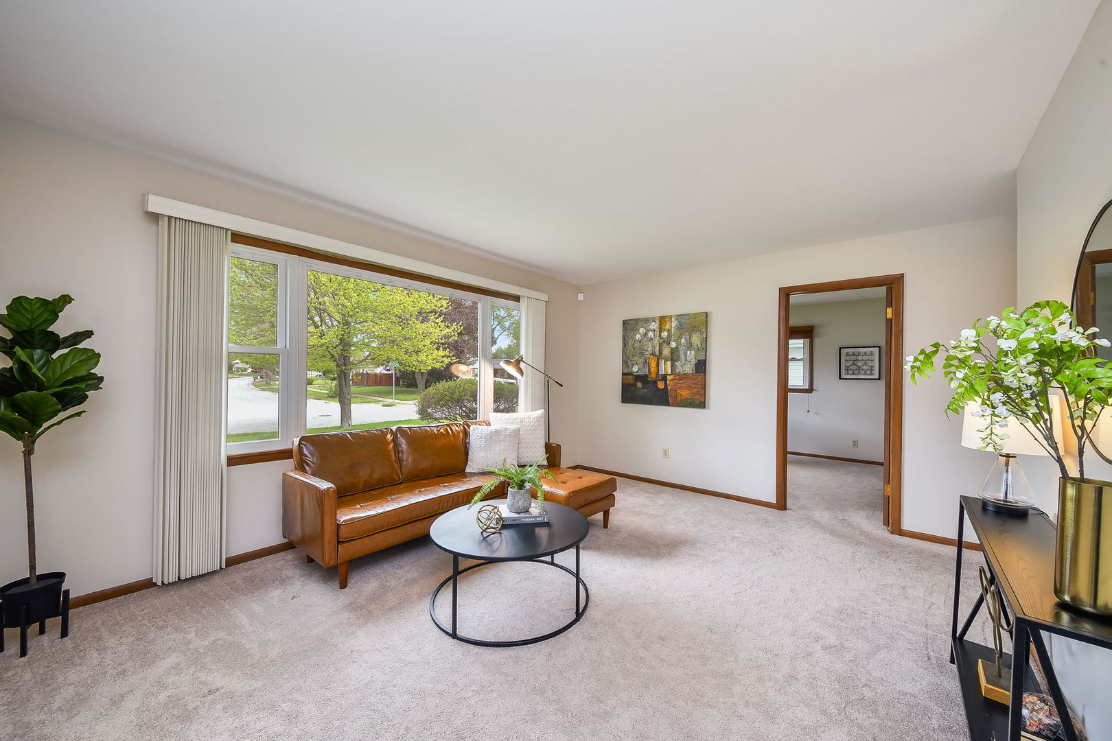 1920 Richard Street Aurora, IL 60506 - Photo 4 of 23 a living room with furniture and a floor to ceiling window