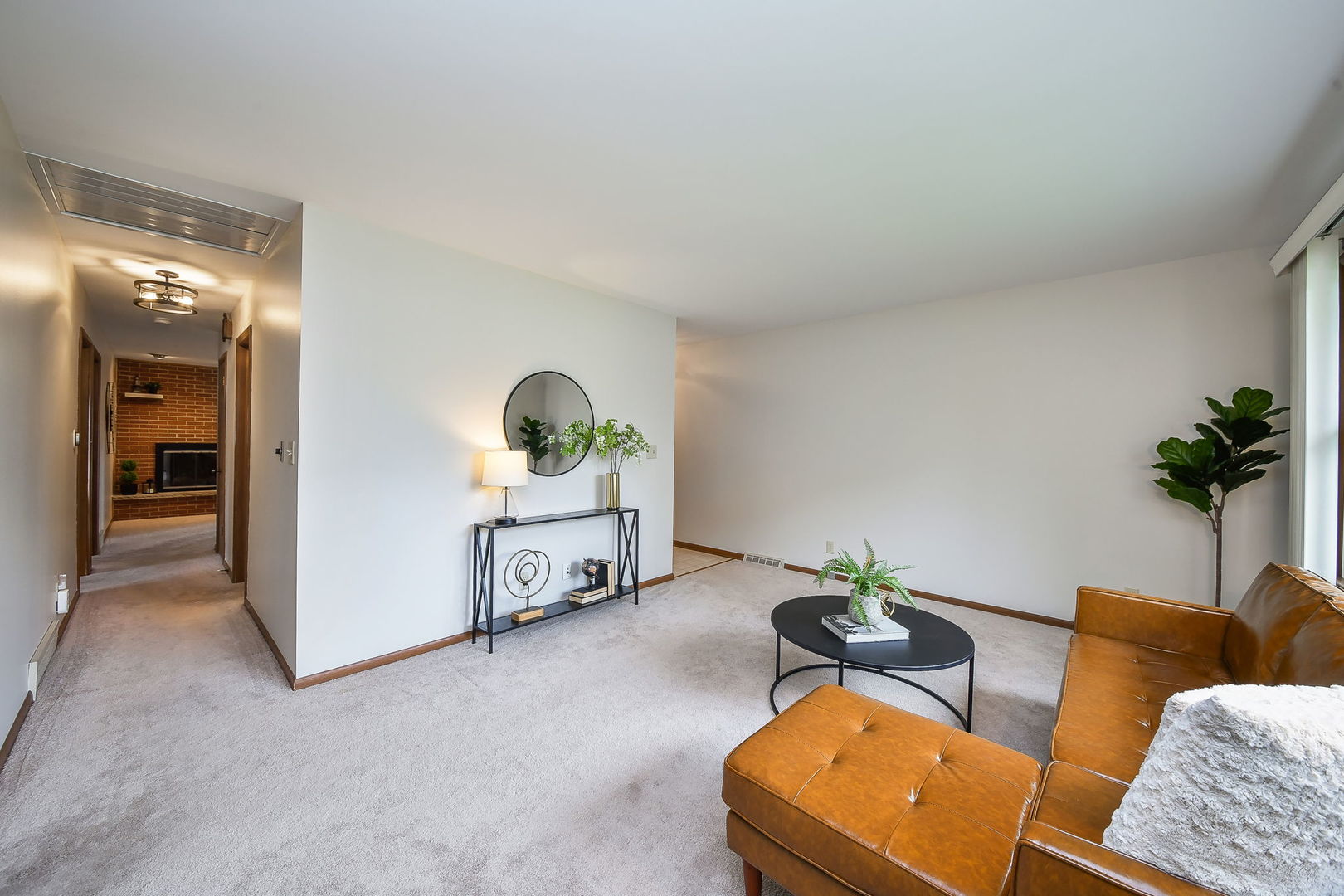 1920 Richard Street Aurora, IL 60506 - Photo 5 of 23 a living room with furniture flowerpot and a potted plant