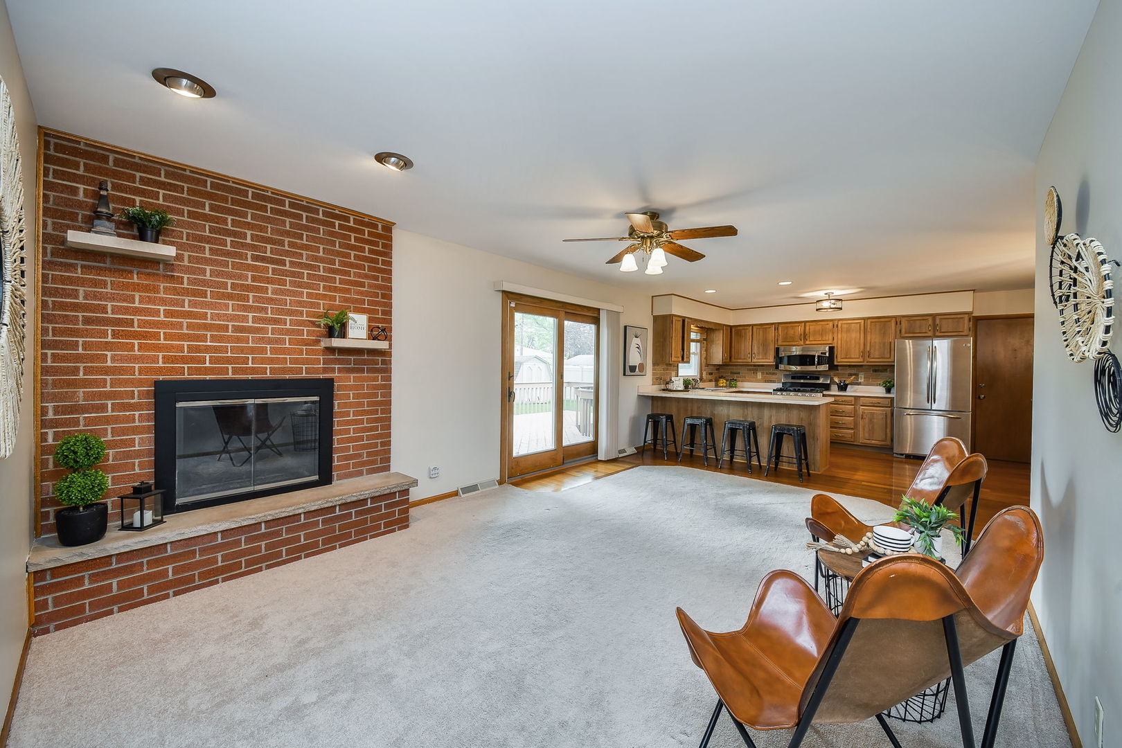 1920 Richard Street Aurora, IL 60506 - Photo 6 of 23 a living room with furniture and kitchen view
