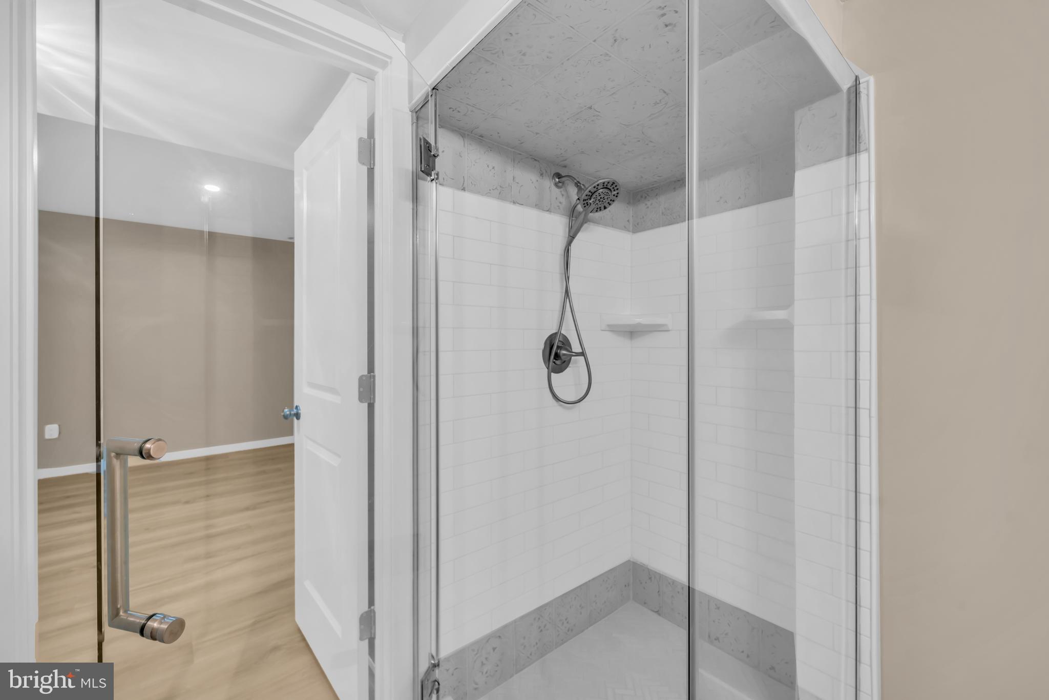 1806 North Shore Court Reston, VA 20190 - Photo 47 of 58 Lower level shower w/framless glass