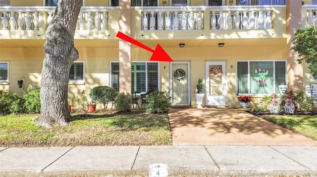 a view of a chairs and room in the back