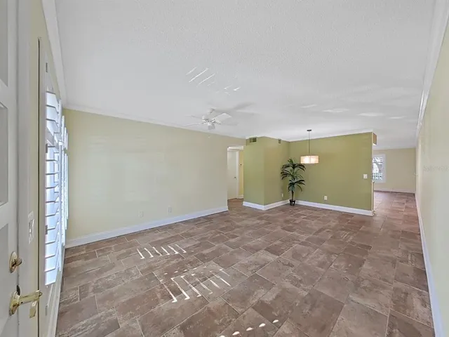 a view of a big room with a fireplace