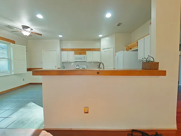 a view of a kitchen with a sink