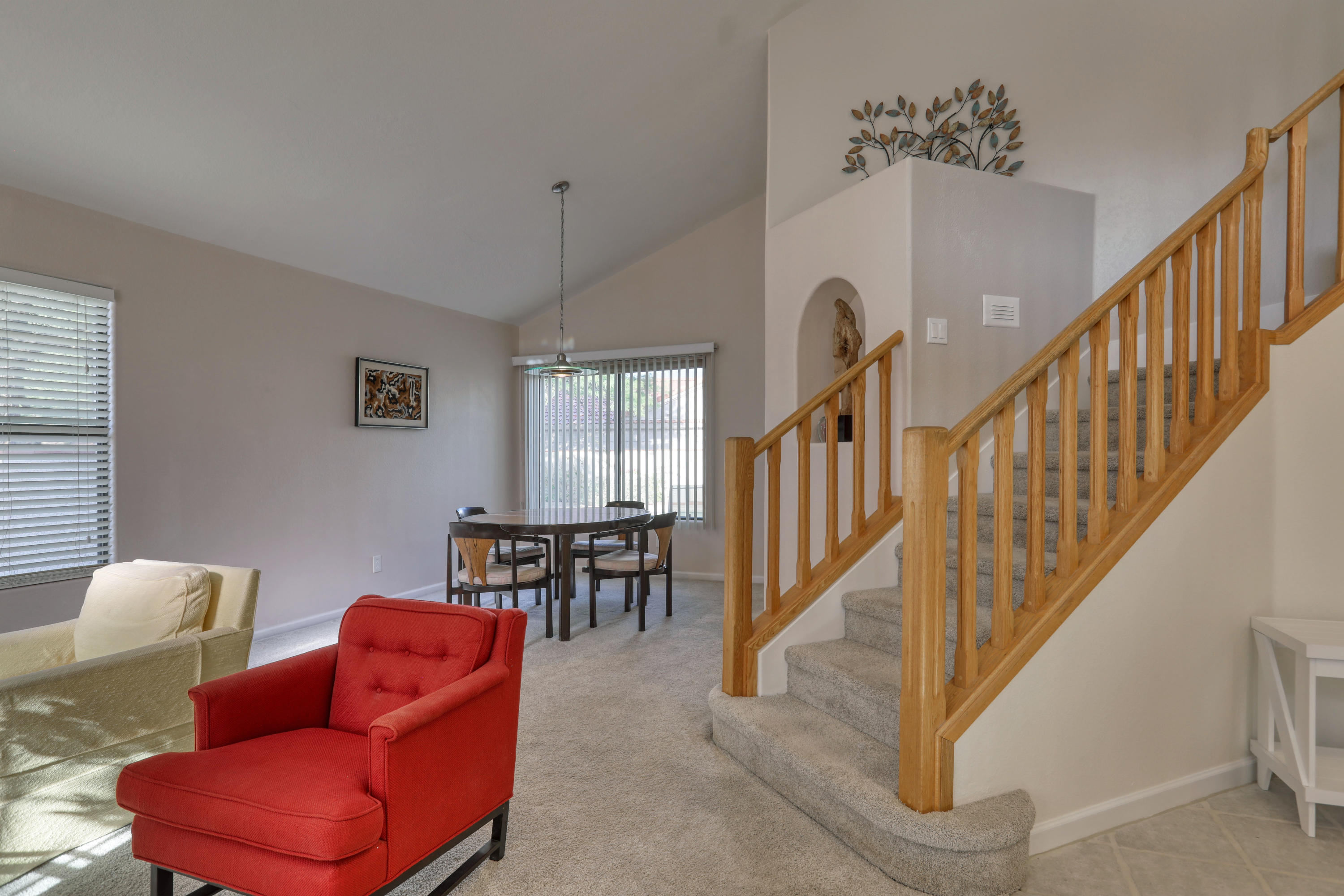 12560 North Wayfarer Way Oro Valley, AZ 85755 - Photo 24 of 43 a living room with furniture and a dining table