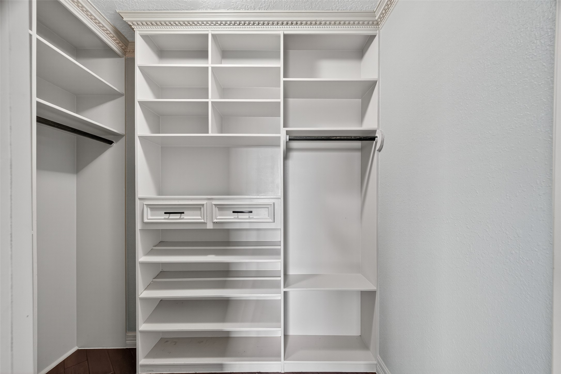 16809 Market Street Channelview, TX 77530 - Photo 26 of 35 a view of walk in closet with empty racks