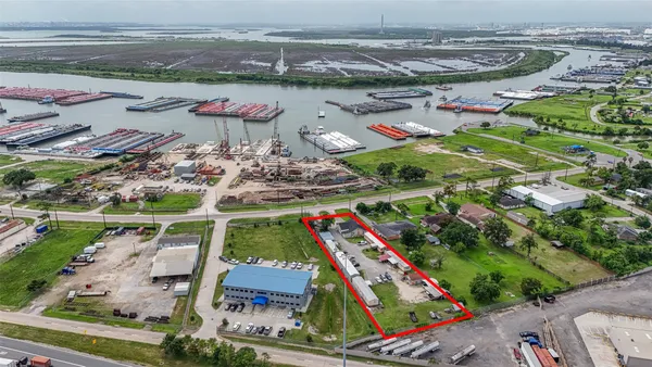 an aerial view of a an swimming pool and outdoor space