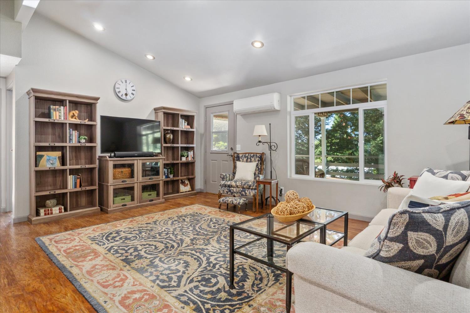 340 Tom Bell Road, Unit 259 Murphys, CA 95247 - Photo 13 of 43 Living room features vaulted ceilings with canned lighting.