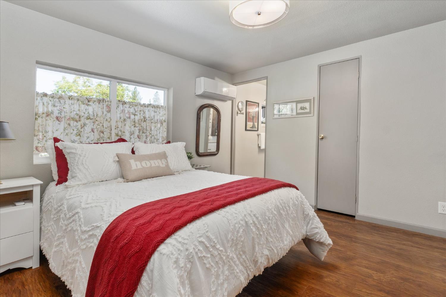 340 Tom Bell Road, Unit 259 Murphys, CA 95247 - Photo 16 of 43 Primary bedroom includes a linen closet, custom lighting and mini-split.