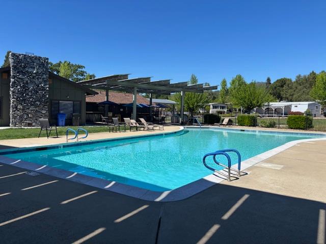 340 Tom Bell Road, Unit 259 Murphys, CA 95247 - Photo 41 of 43 Murphys Diggins boasts a large pool with covered and uncovered areas for lounging.