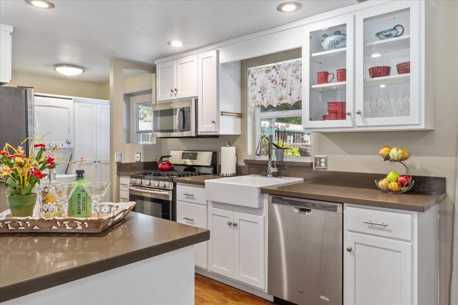 340 Tom Bell Road, Unit 259 Murphys, CA 95247 - Photo 6 of 43 Kitchen features Mennonite-made custom cabinets, quarts counters, farm sink and custom lighting.