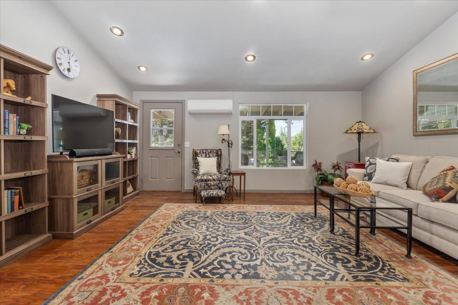340 Tom Bell Road, Unit 259 Murphys, CA 95247 - Photo 9 of 43 Large living room with extra tall view windows. Easy-care laminate flooring throughout.
