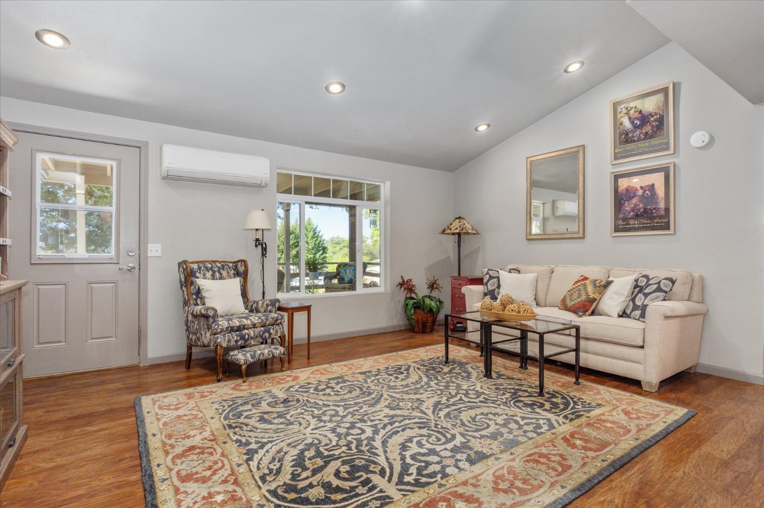 340 Tom Bell Road, Unit 259 Murphys, CA 95247 - Photo 10 of 43 Living room features canned lighting, mini-split and access to backyard screened in porch.