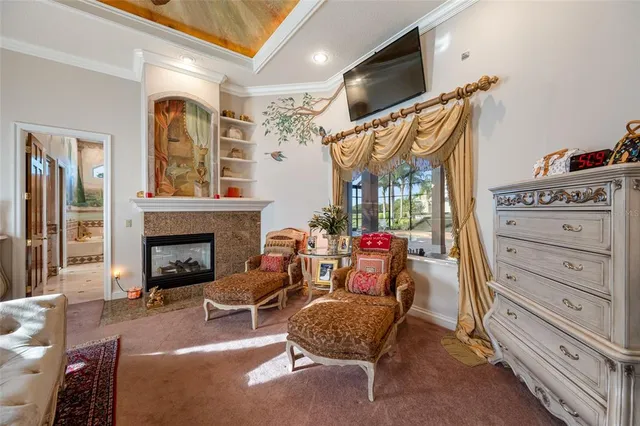 a bathroom with a sink mirror and a table