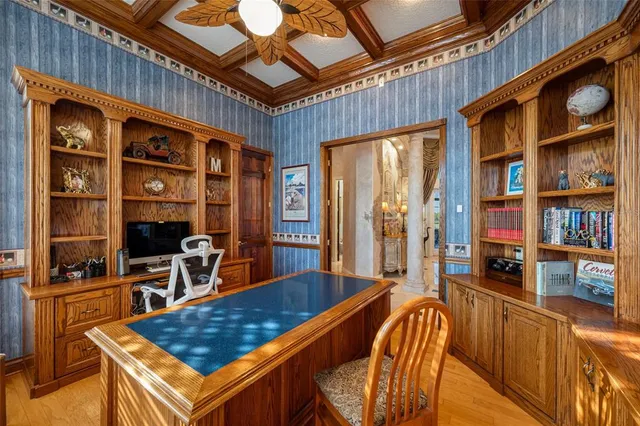 a bathroom with a toilet a sink and a mirror