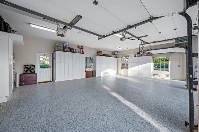 a view of a swimming pool with an outdoor space and seating area