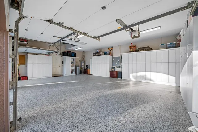 a view of a patio with swimming pool table and chairs