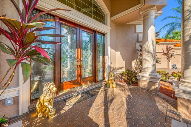 a view of a swimming pool with a patio