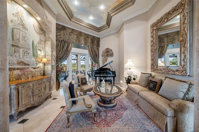 a view of a livingroom with furniture and a chandelier