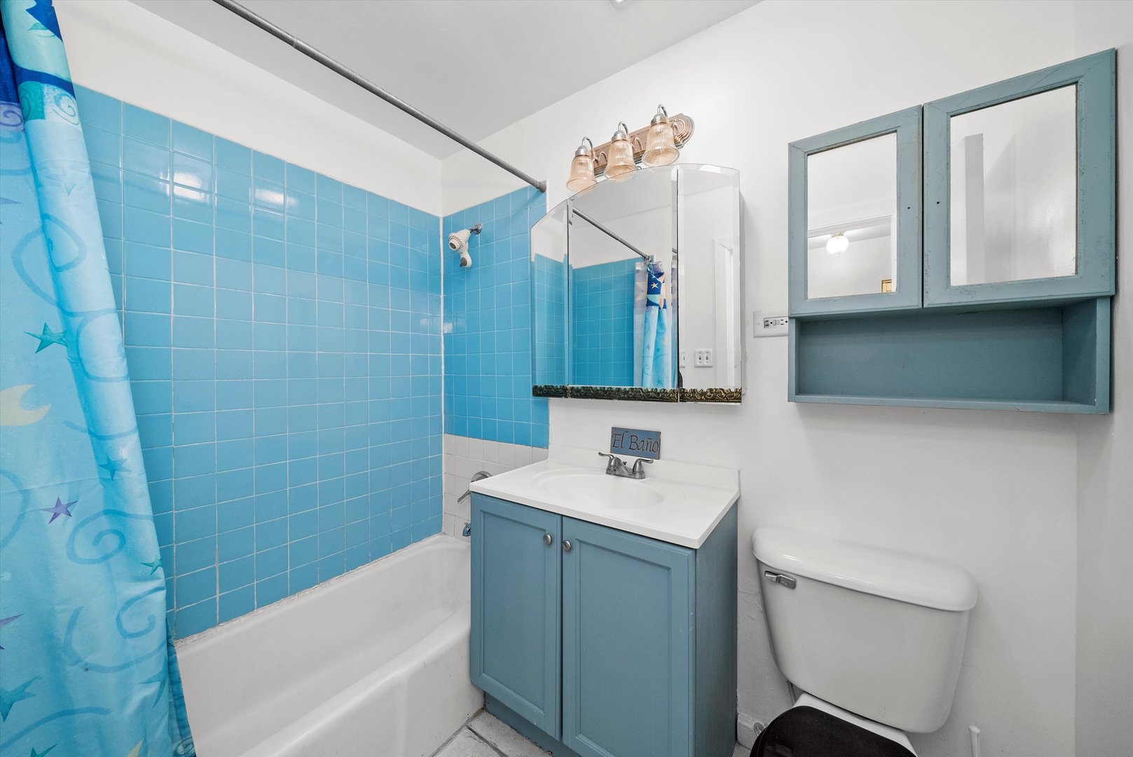 903 West 19th Street, Unit 3 Chicago, IL 60608 - Photo 11 of 16 a bathroom with a sink a toilet and shower