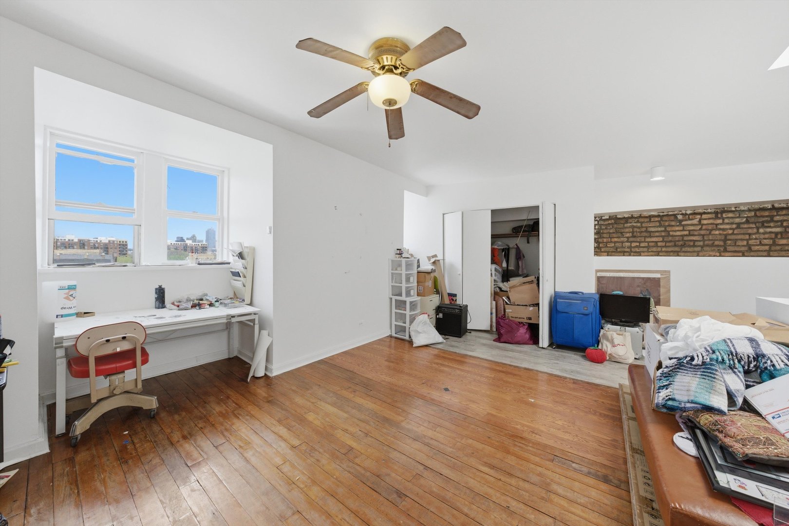 903 West 19th Street, Unit 3 Chicago, IL 60608 - Photo 7 of 16 a view of a livingroom with furniture and a fireplace