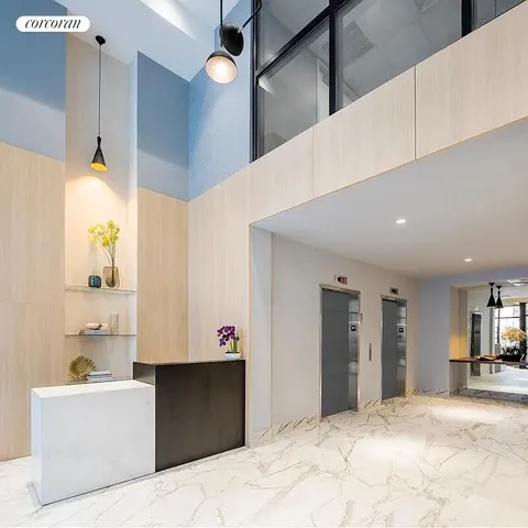 a front view of a building with glass windows