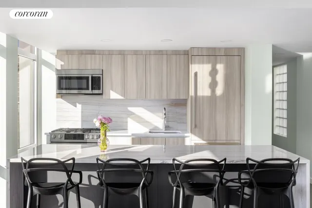 a view of a terrace with sitting area