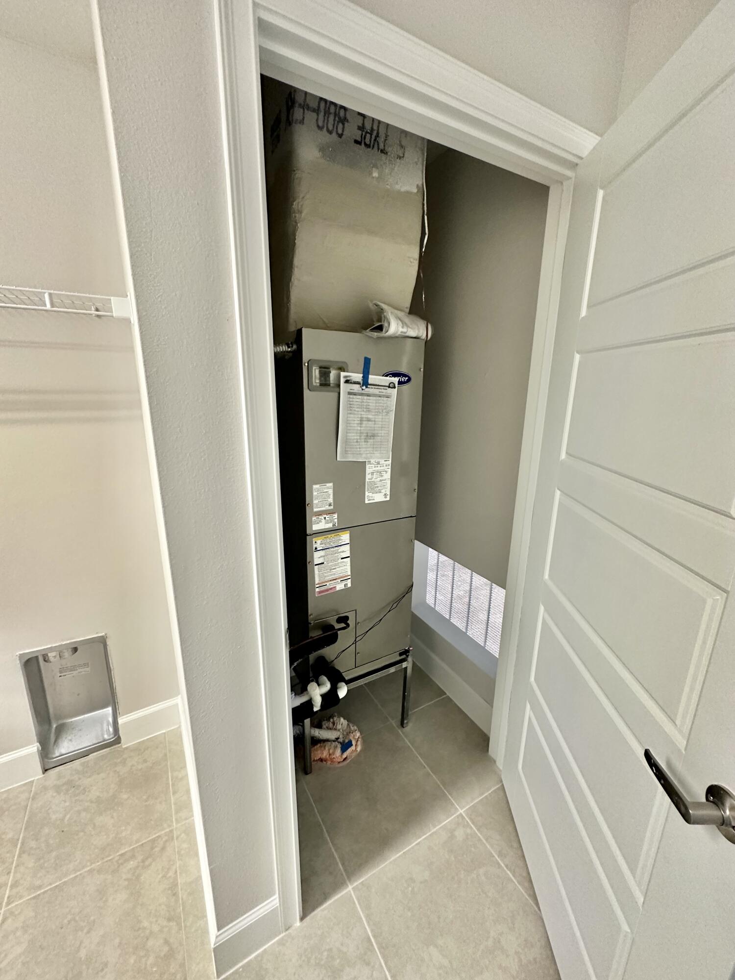 8634 Modeno Street Fort Pierce, FL 34951 - Photo 12 of 34 a view of an entryway with a bedroom