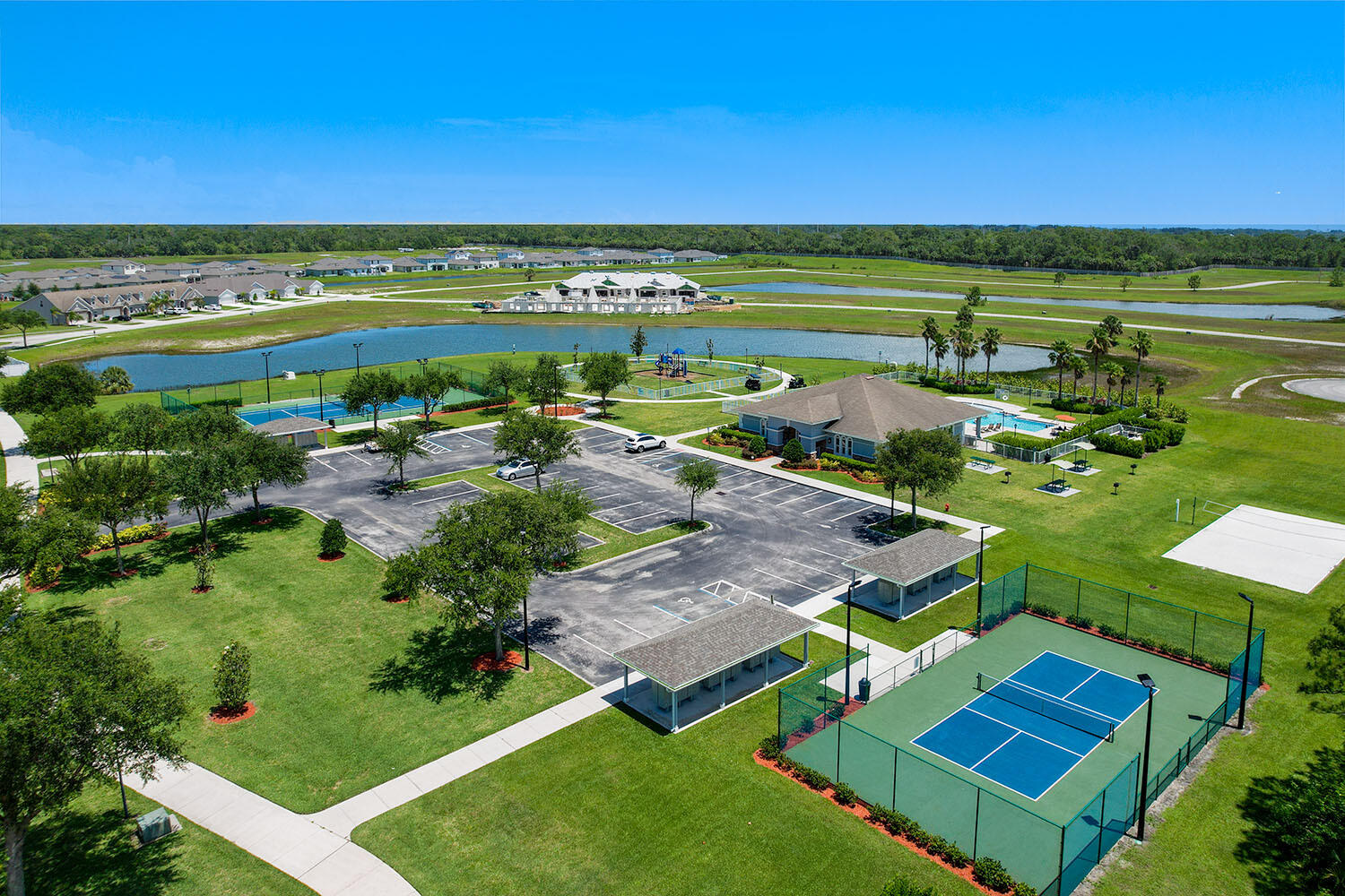 8634 Modeno Street Fort Pierce, FL 34951 - Photo 34 of 34 an aerial view of residential houses with outdoor space and swimming pool