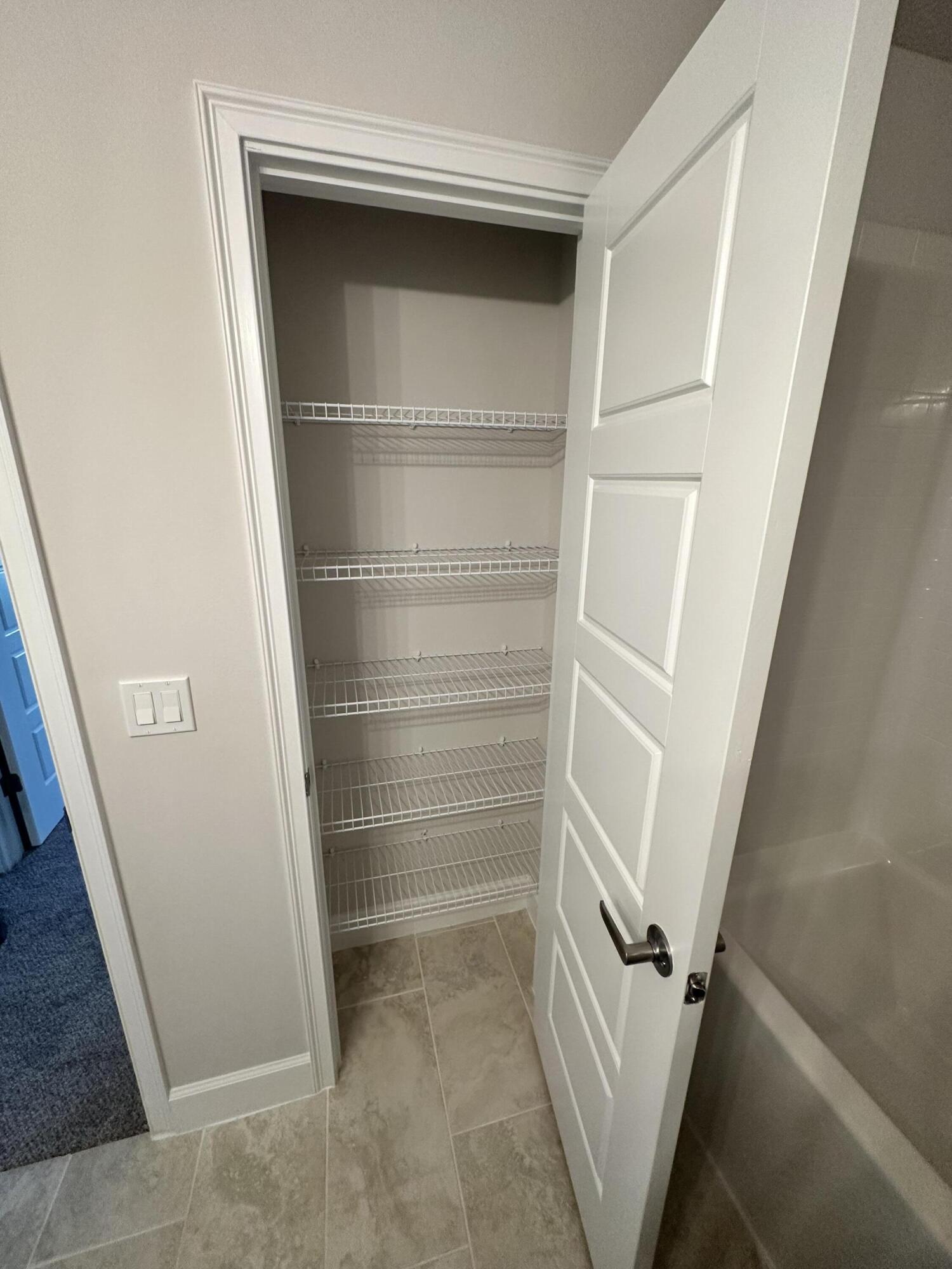 8634 Modeno Street Fort Pierce, FL 34951 - Photo 8 of 34 a view of walk in closet