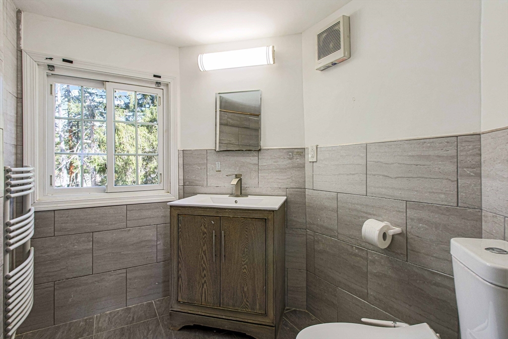 5 Old Brook Drive Worcester, MA 01609 - Photo 29 of 42 a bathroom with a sink toilet and shower