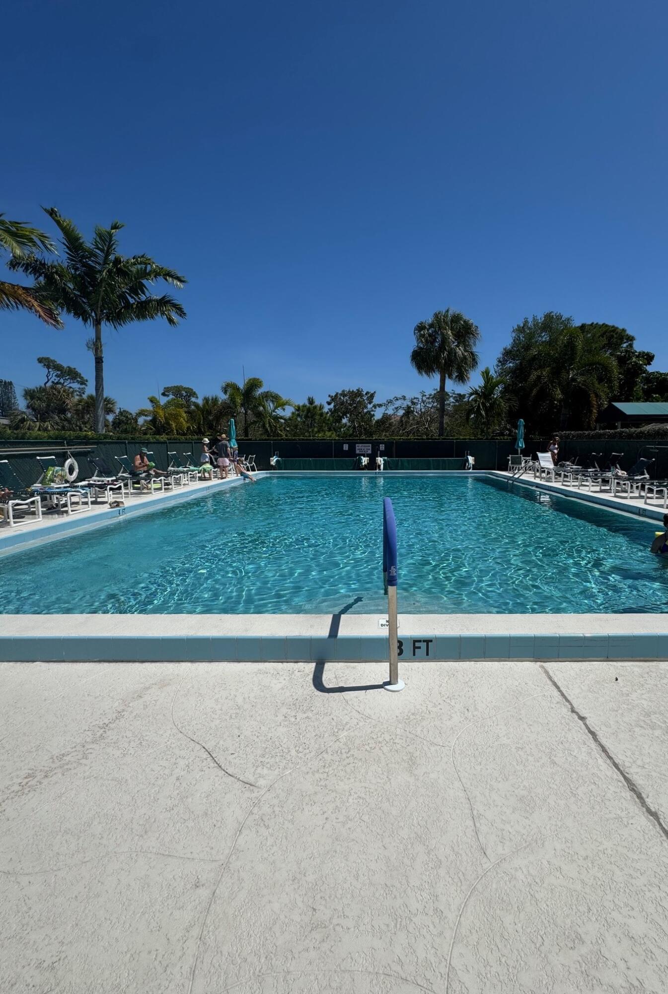 2950 Southeast Ocean Boulevard, Unit 110202 Stuart, FL 34996 - Photo 24 of 25 a park view with a bench